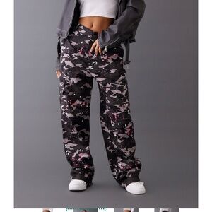 PLT grey/black cargo like pants with a paint splatter design